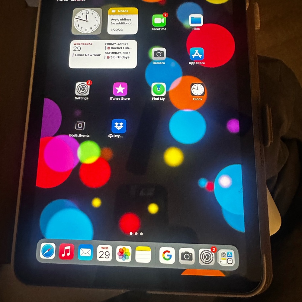 Apple Black Tablet with Colorful Interface and Slim Design